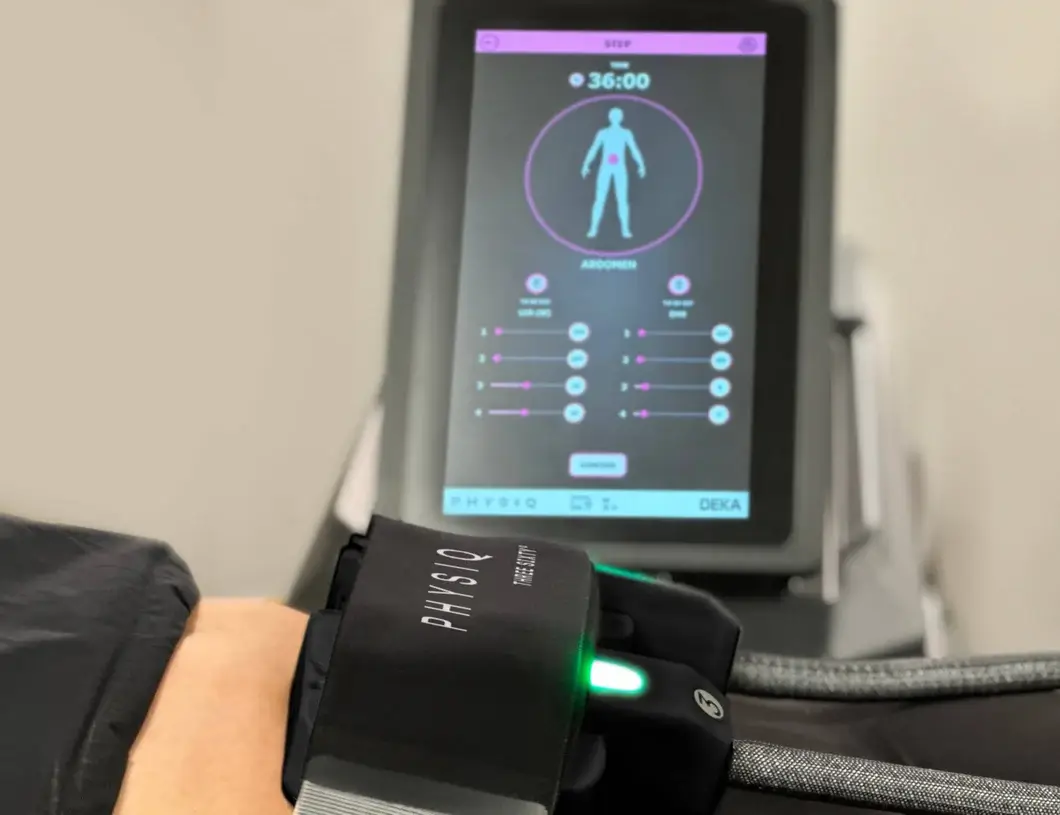 PHYSIQ 360 treatment on womans abdomen.jpg PHYSIQ 360 treatment on woman's abdomen at K2 Restorative Medicine.